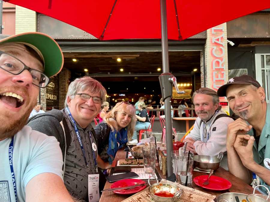 Justin, Tim, Irina, Matthias, and Wilbur at dinner.