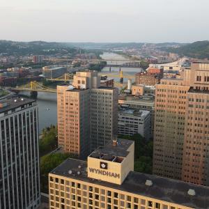 Skyline of Pittsburgh with partial view of bridges over river