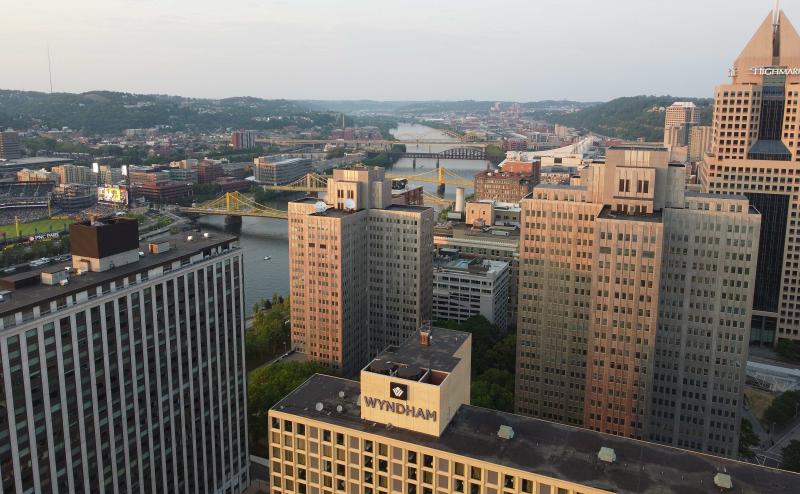 Skyline of Pittsburgh with partial view of bridges over river